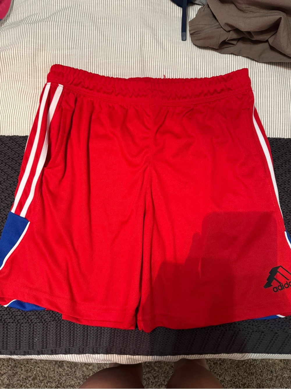 adidas Red Athletic Shorts with White Stripes and Blue Accents